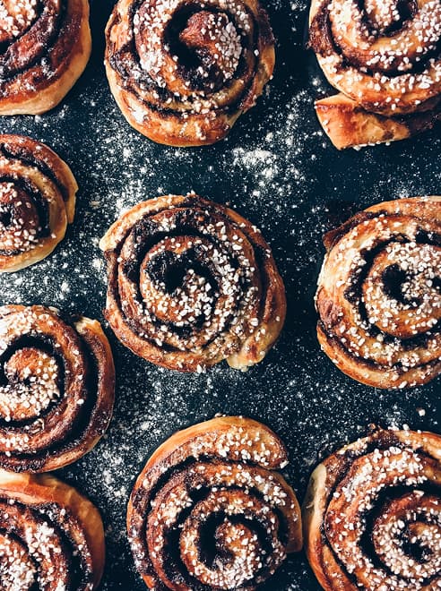a load of cinnamon swirls dusted with icing