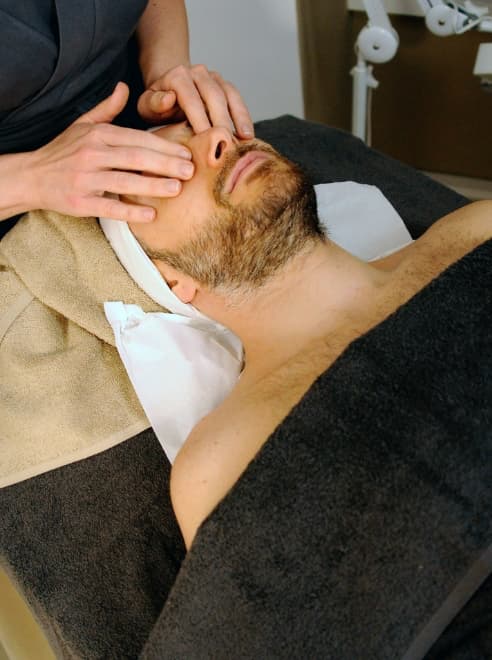 male having face massage