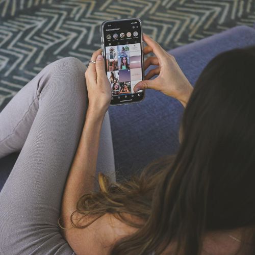 Someone scrolling on their phone