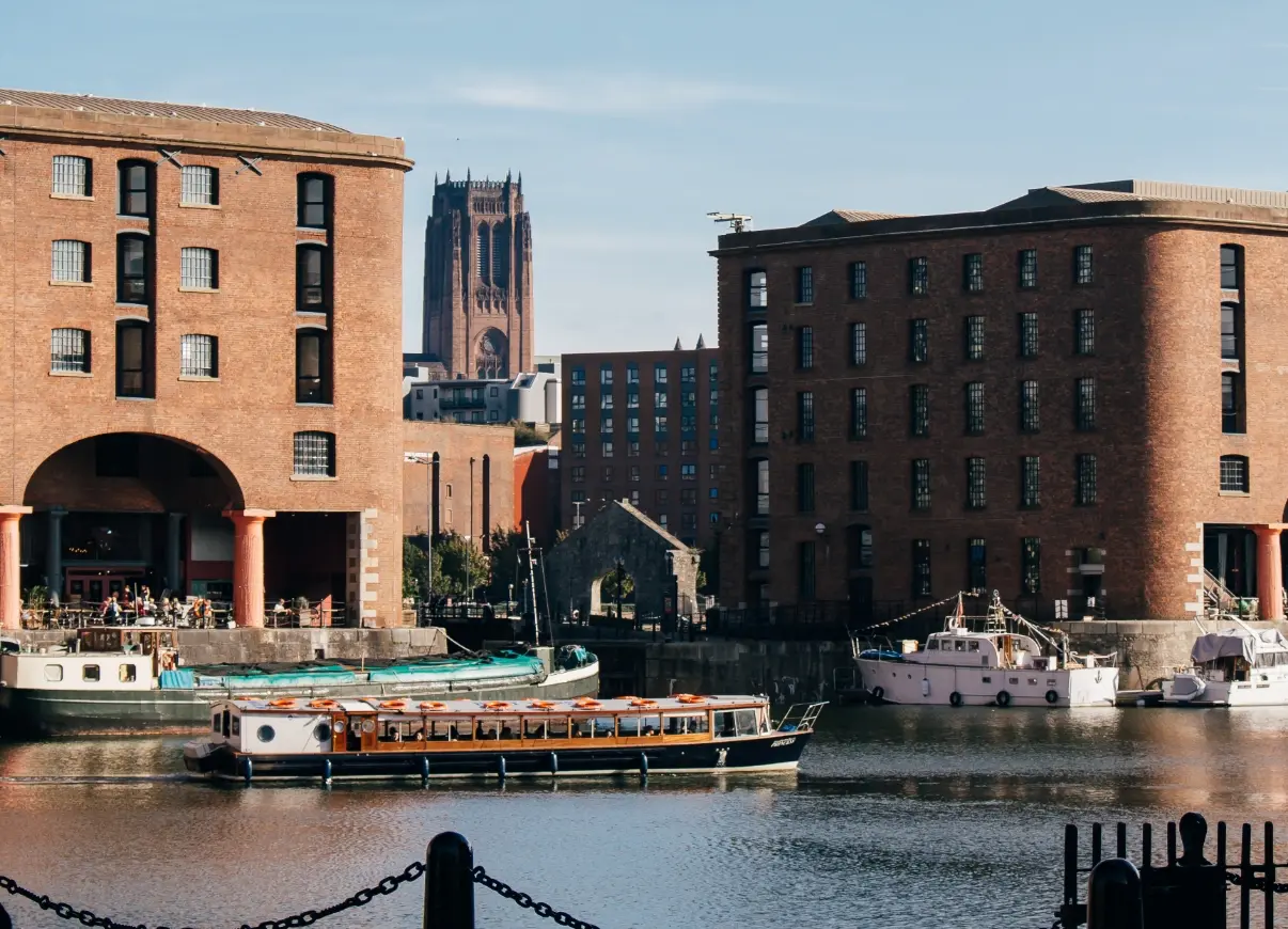 Royal Albert Docks, barges moored on quay side