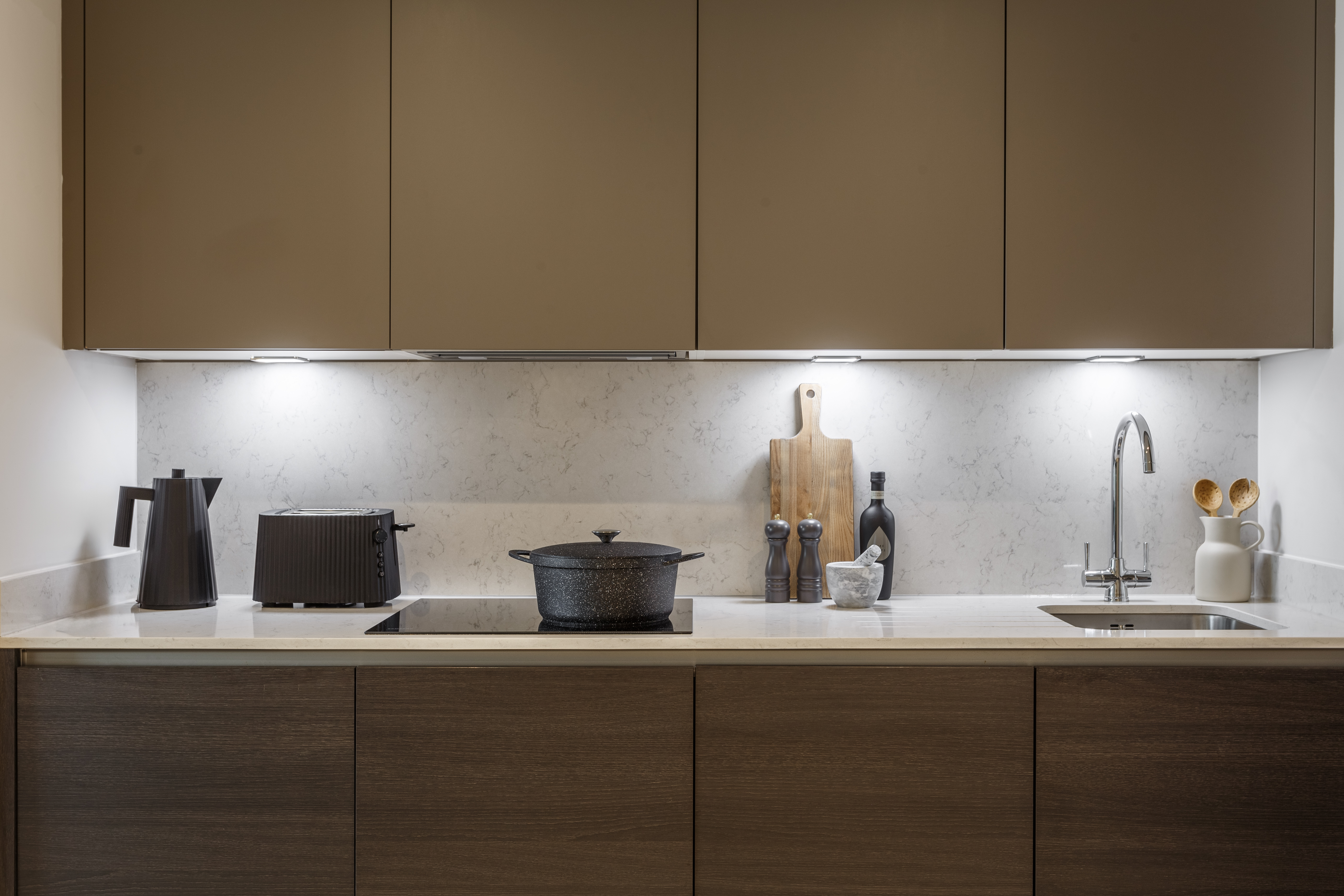 Spacious U shaped kitchen and dining table