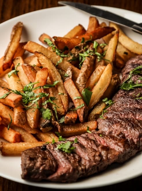 plate of steak and chips